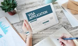Traveller reviewing Dubai visa rejection reasons with passport and application documents