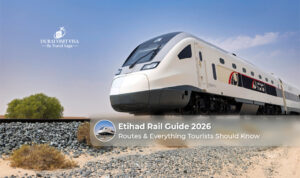 Etihad Rail passenger train traveling through the UAE desert with modern stations and scenic landscapes.